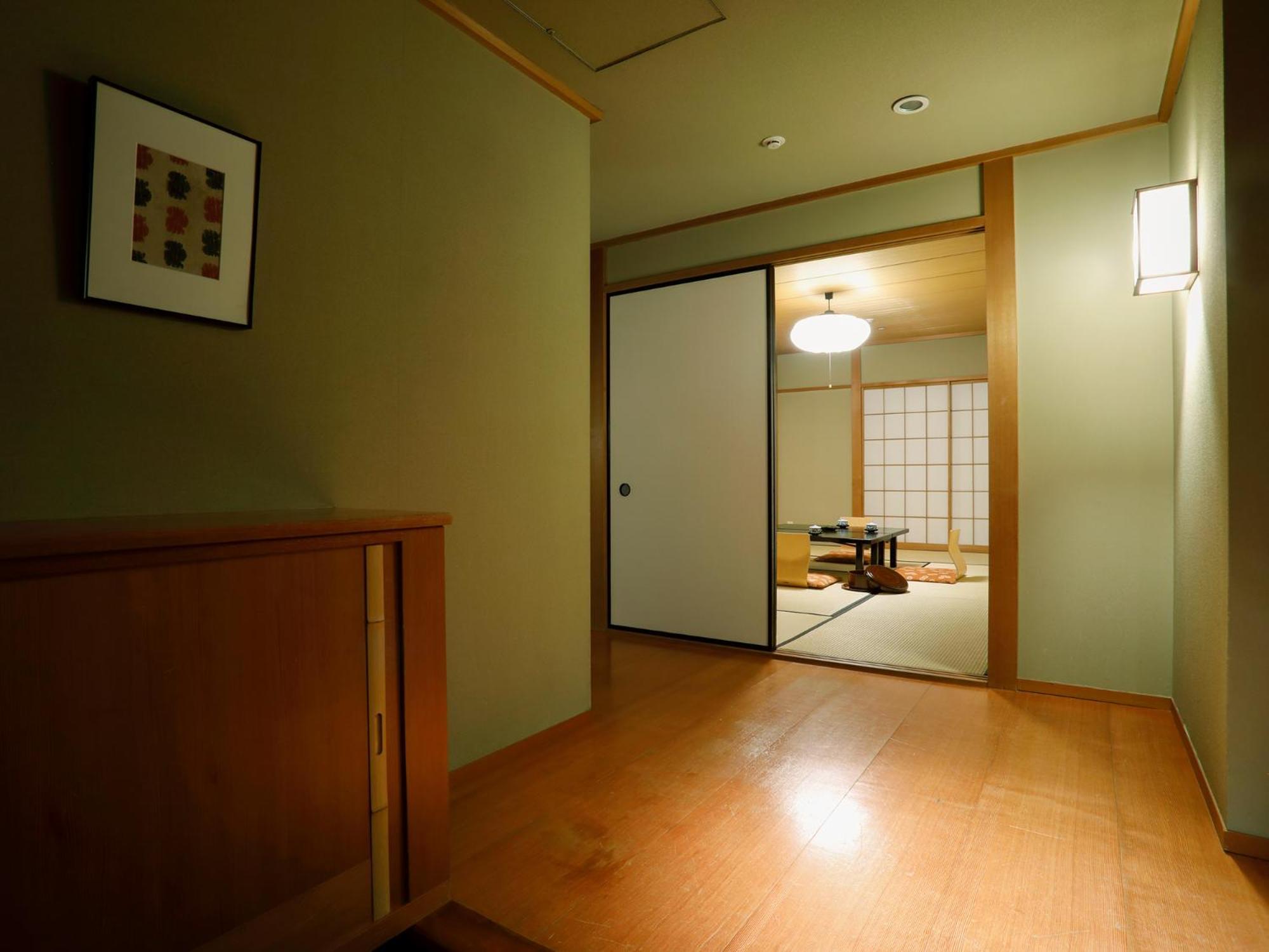 普乐美雅饭店- Tsubaki-札幌酒店 客房 照片 A sliding door in a Japanese house